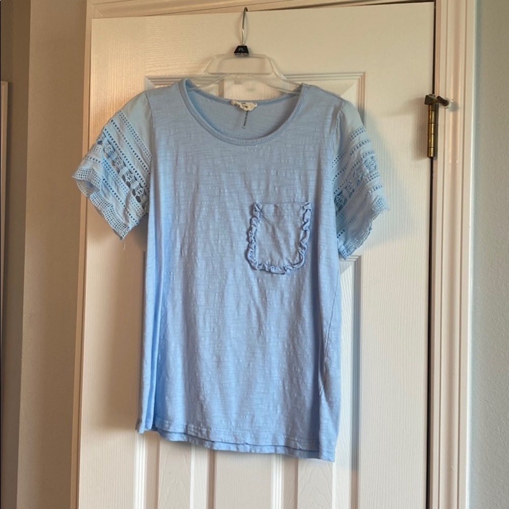 Light blue top with lace sleeves